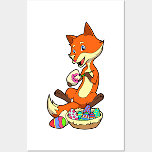 Cute fox painting easter eggs on easter day Posters and Art